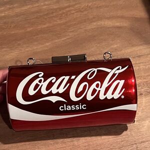 Coca-Cola red can classic model. With removable strap without chain.
